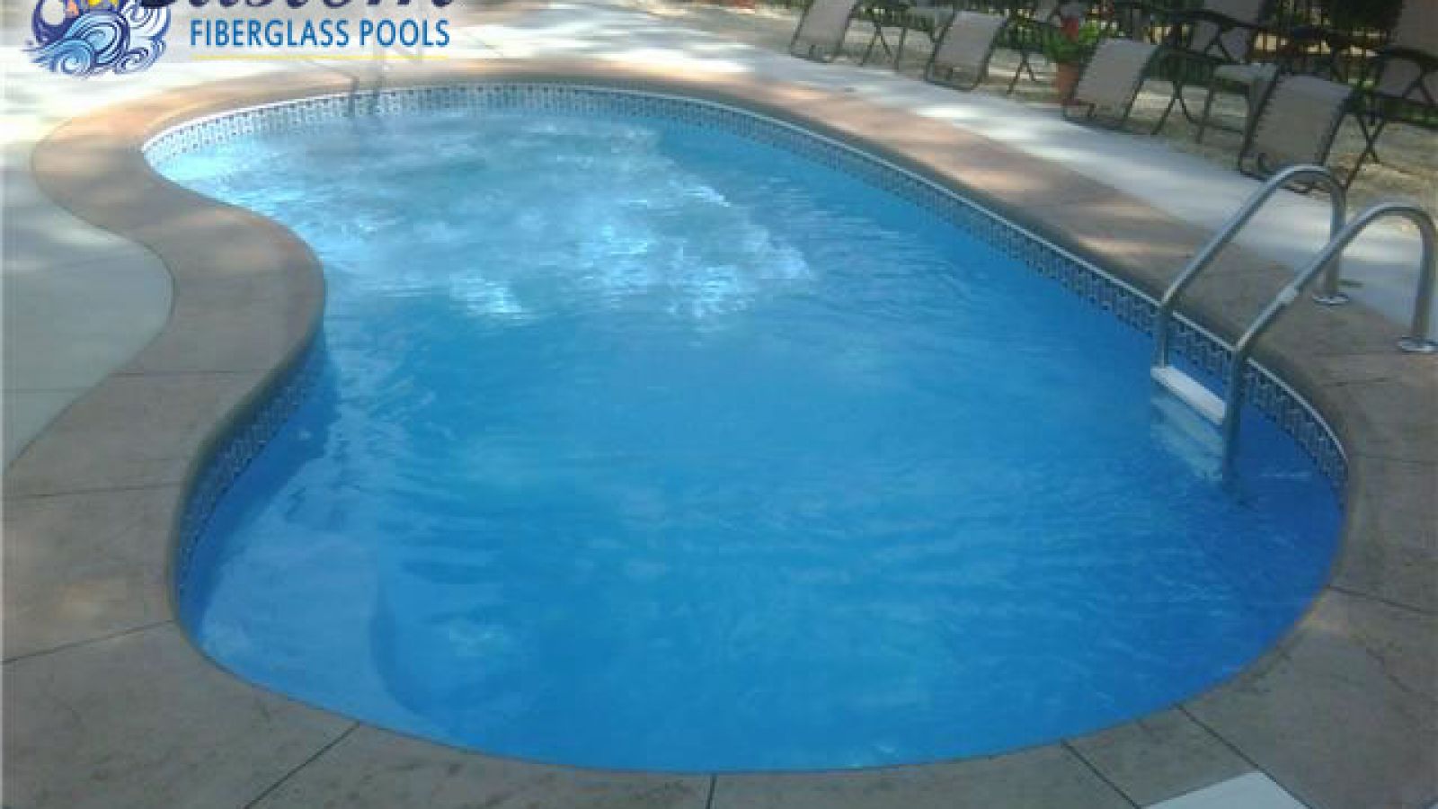 The Caspian Pool: Where Fun and Relaxation Meet Caspian Kidney Fiberglass Pool adding playful charm to a Clarksville, TN backyard