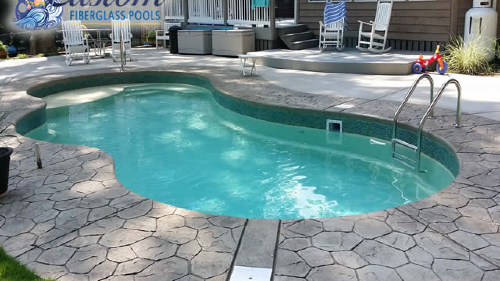 Abacos Custom Fiberglass Pool, a fun and curvy addition to a Clarksville, TN backyard