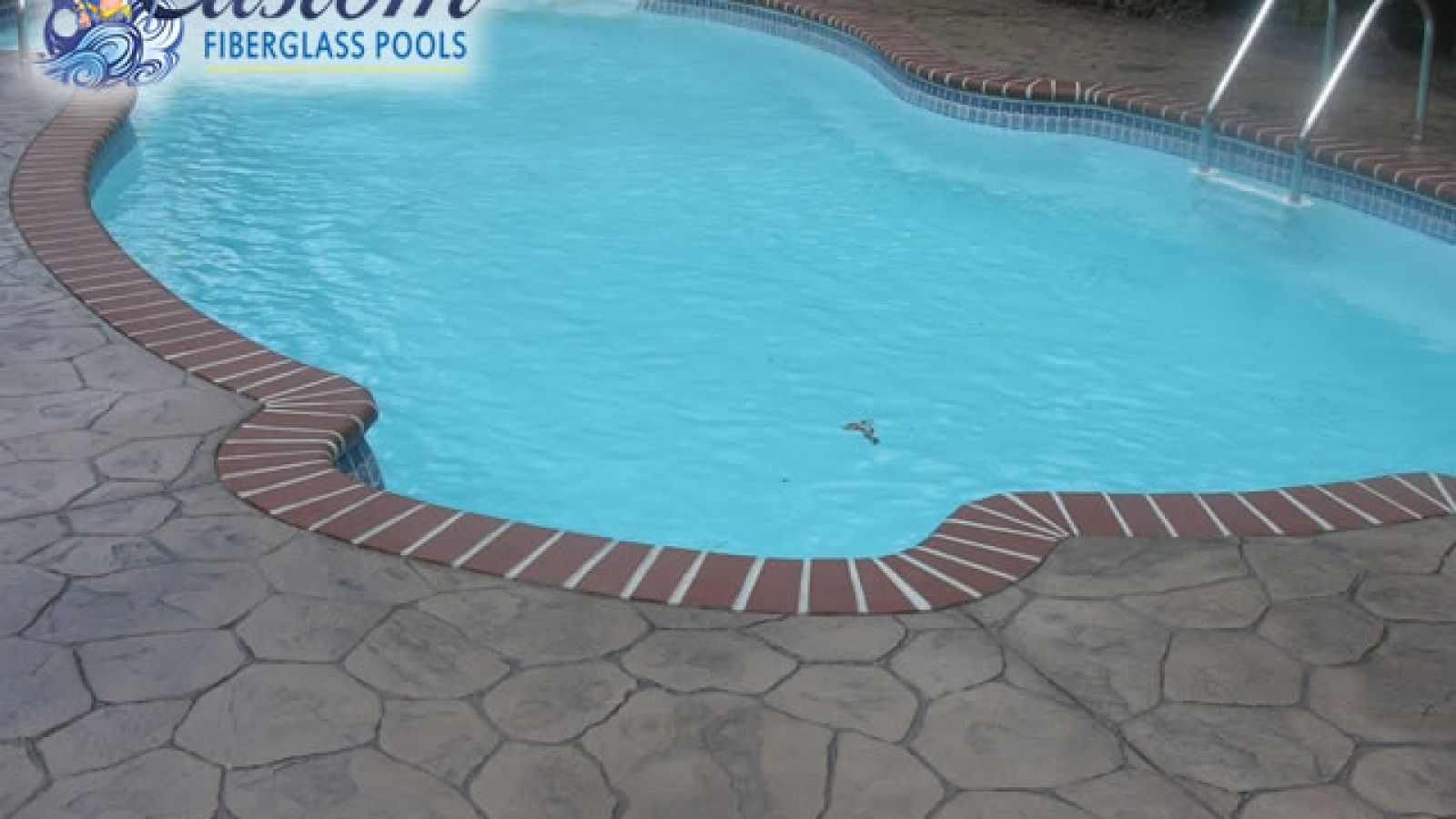 Catalina Freeform Fiberglass Pool, a luxurious and stylish addition to a Clarksville, TN backyard