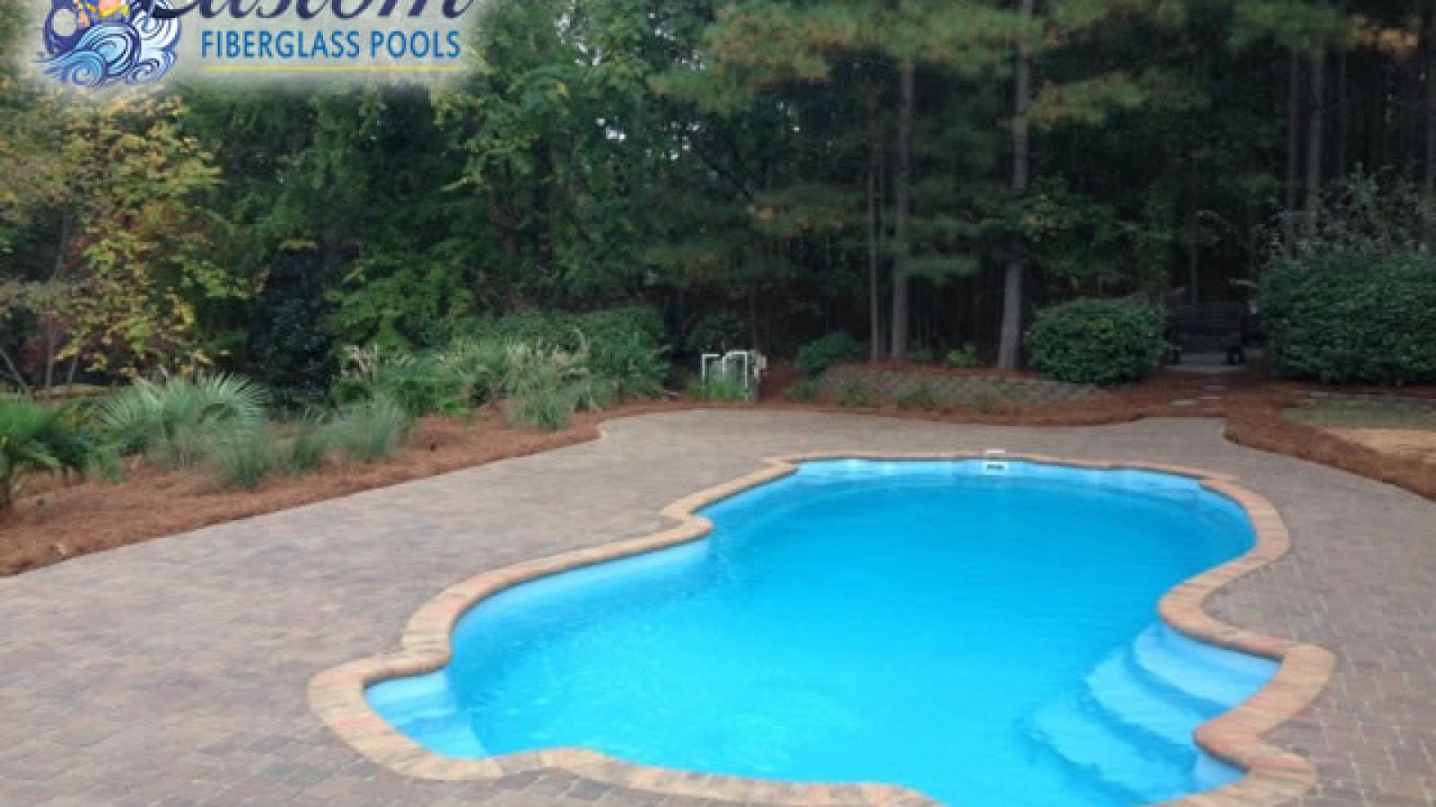 Key West Freeform Fiberglass Pool, a chic and spacious addition to a Clarksville, TN backyard