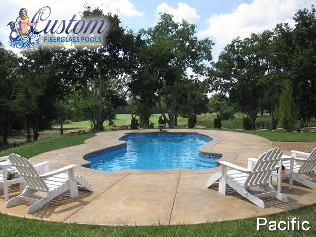 Pacific Deep Fiberglass Pool, a luxurious and curvaceous addition to a Clarksville, TN backyard