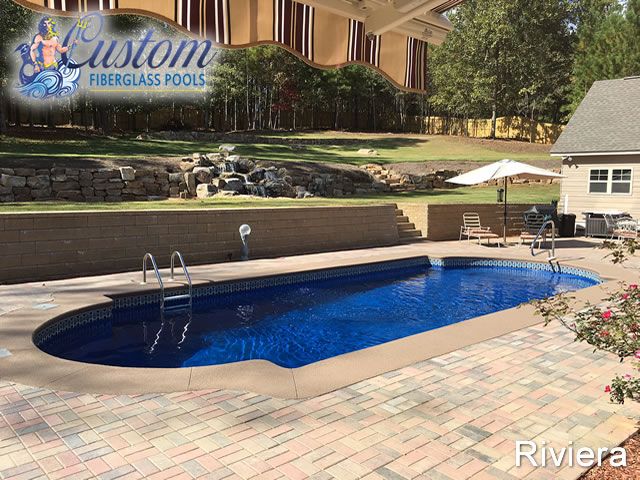 Riviera Roman Fiberglass Pool, a spacious and elegant addition to a Clarksville, TN backyard