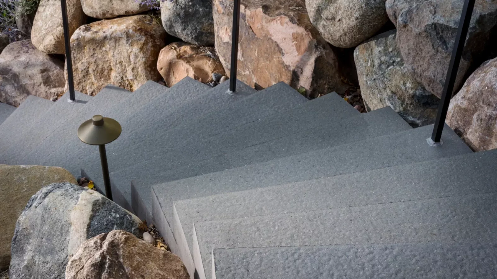 Landings™ Step with a limestone-inspired texture, exclusively at AR Stoneworks & Outdoor Living.