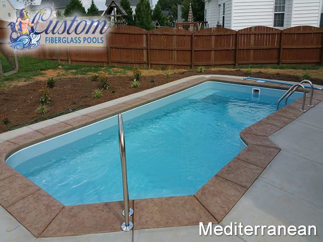 Mediterranean Custom Fiberglass Pool, a sleek and modern addition to a Clarksville, TN backyard