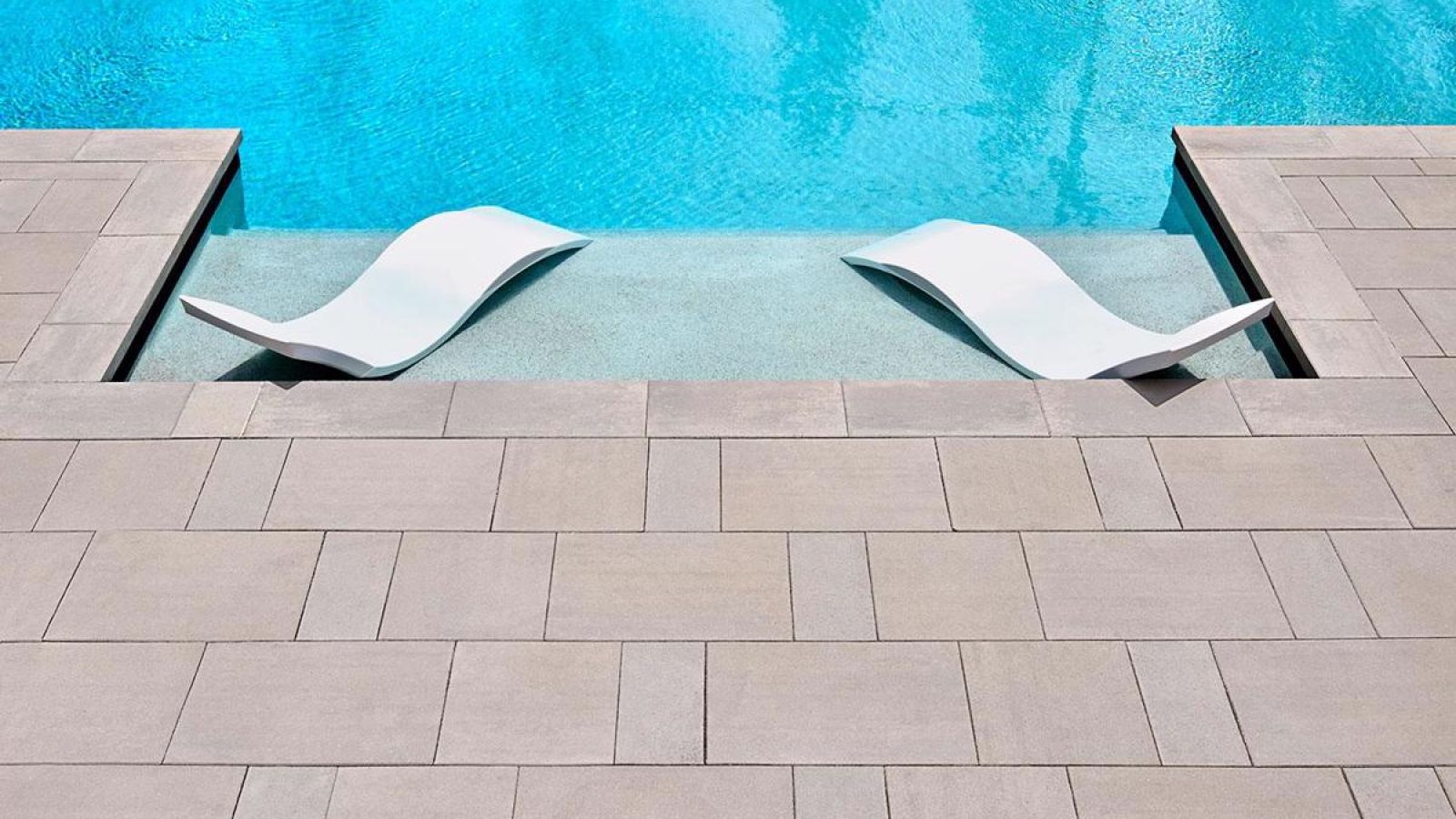 Para modern concrete patio slabs installed in an elegant outdoor setting
