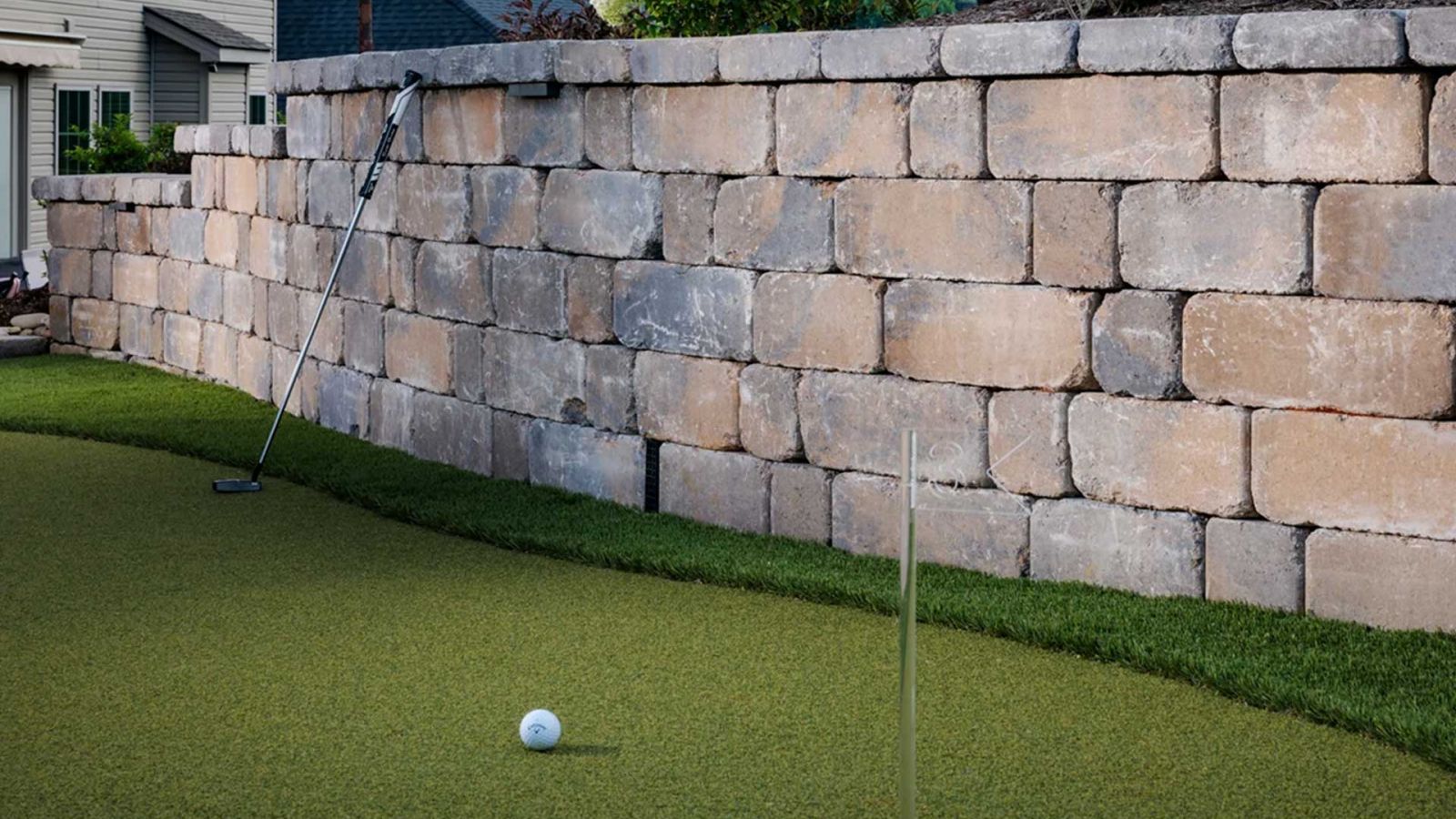 Diverse wall systems by AR Pools • Stoneworks & Outdoor Living, highlighting both form and function.