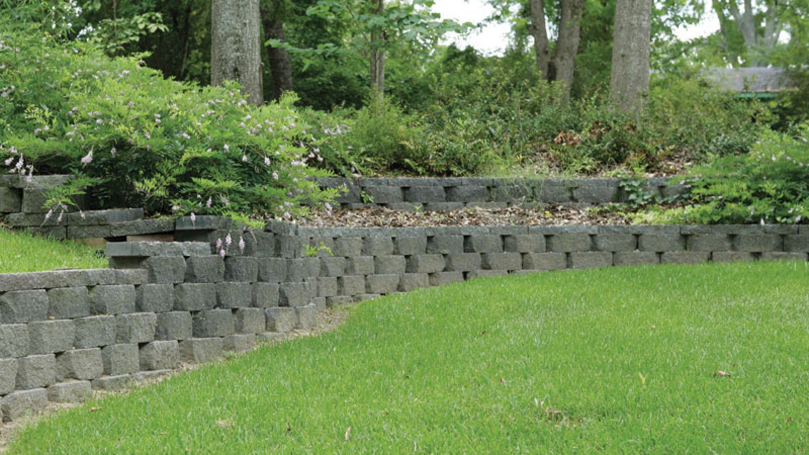 Valera® Retaining Wall blocks by Keystone Hardscapes, showcasing unparalleled design finesse, displayed at AR Pools • Stoneworks & Outdoor Living.