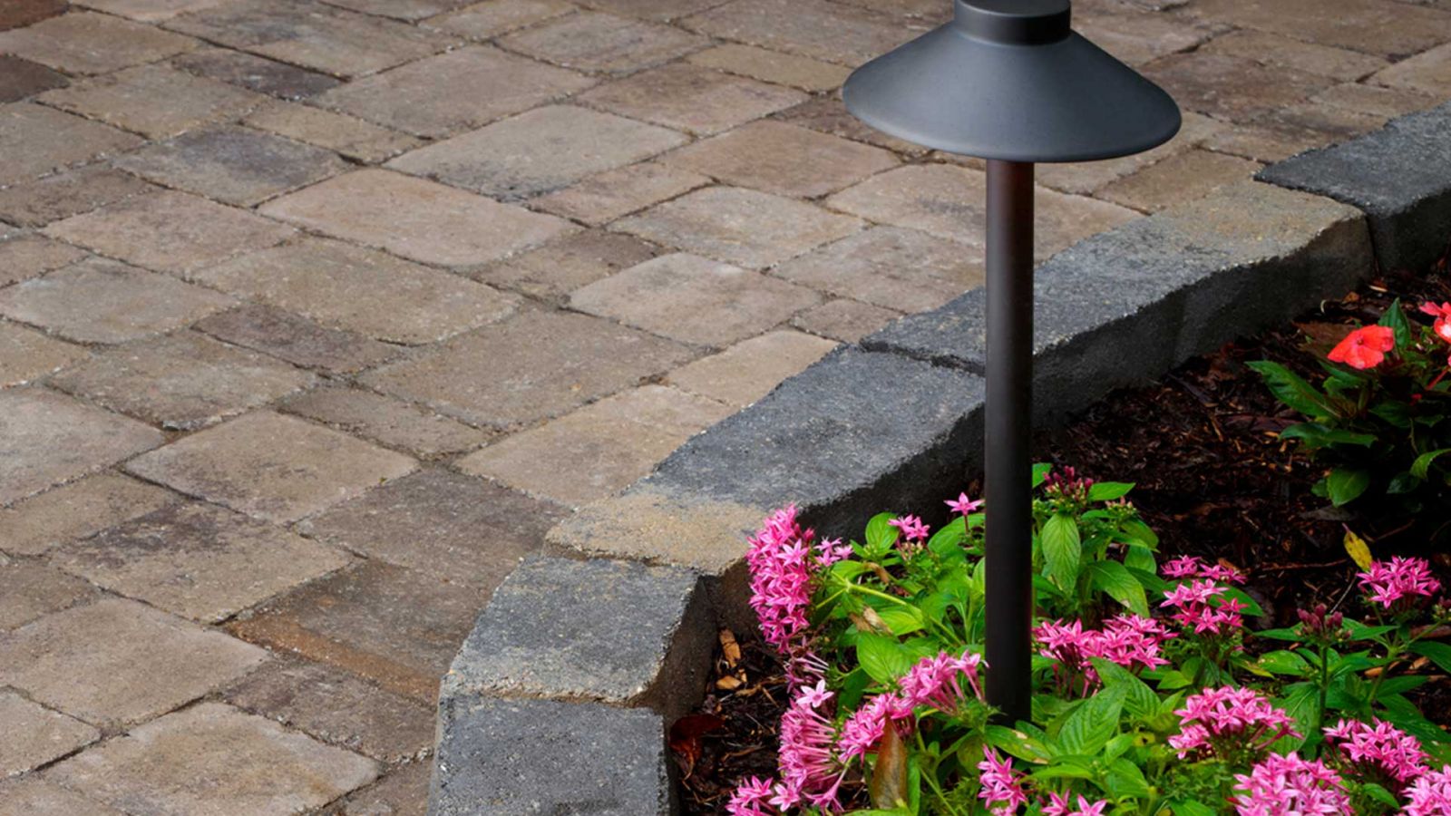 Variety of hardscape accessories by AR Pools • Stoneworks & Outdoor Living, including caps, coping, and edgers.