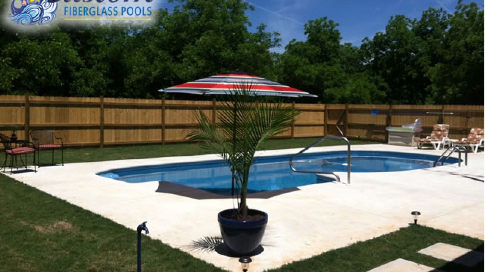 The Key Largo Pool: Where Unique Design Meets Luxury Key Largo Unique Fiberglass Pool, a luxurious and spacious addition to a Clarksville, TN backyard